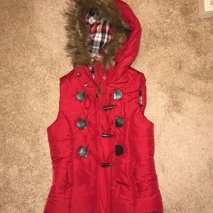 Like new size small red puffer vest with toggles